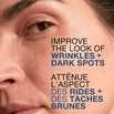 Women's face with text, 'improve the look of wrinkles and dark spots'