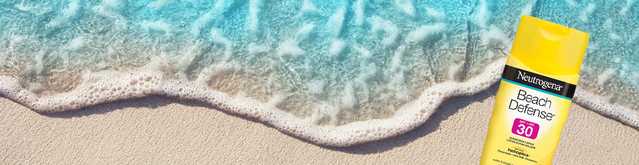 NEUTROGENA® Beach Defense® sunscreen on a beach